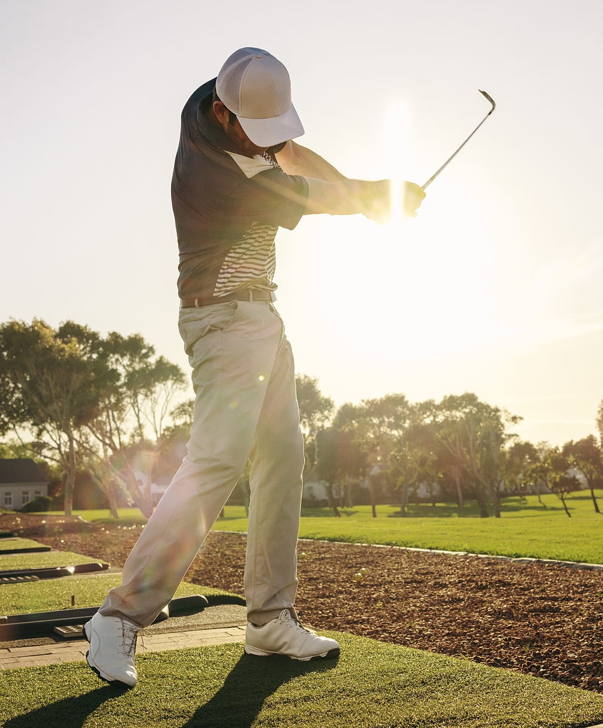 Smiling man in black tank top, healthy lifestyle.