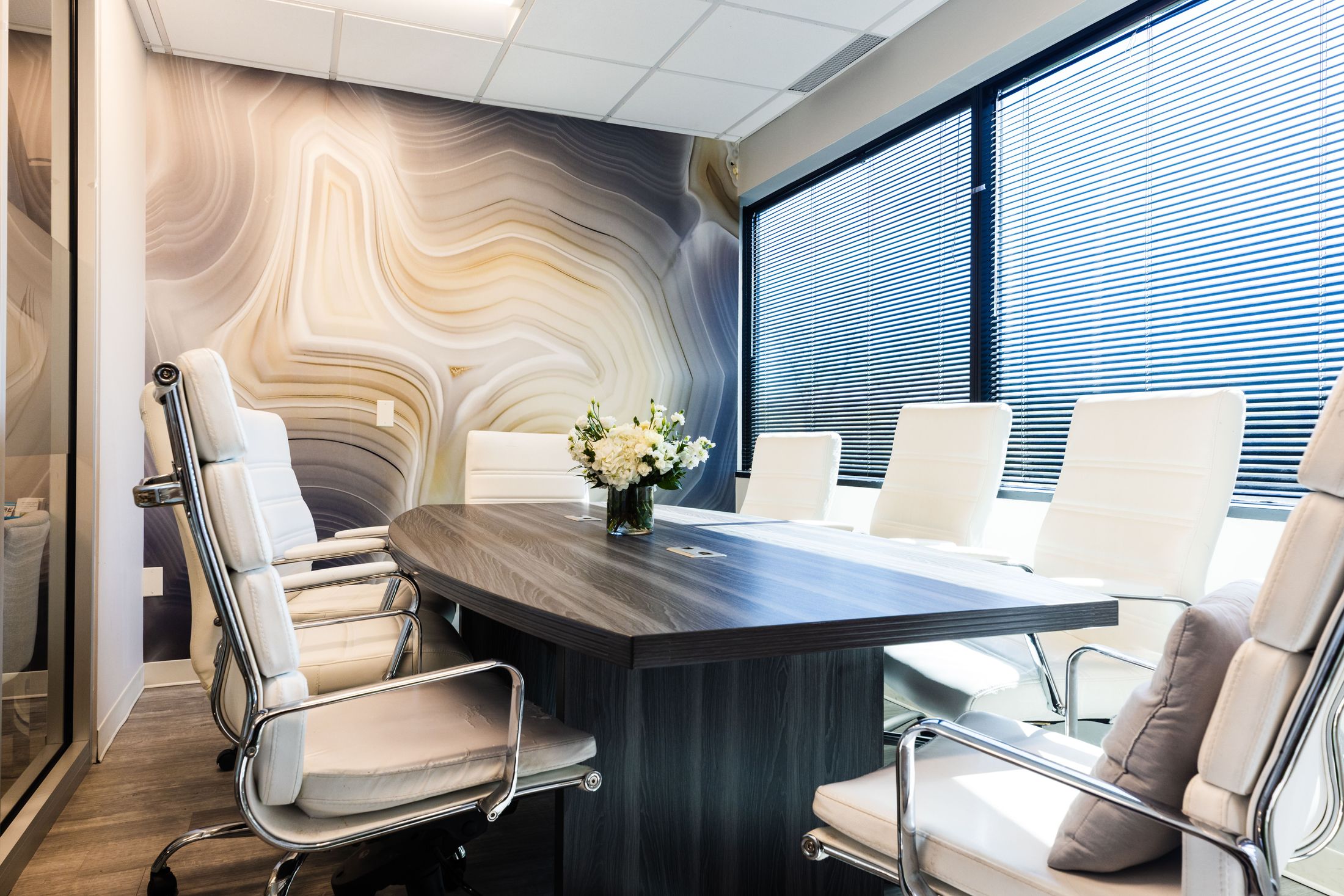 Modern conference room with stylish seating and decor.